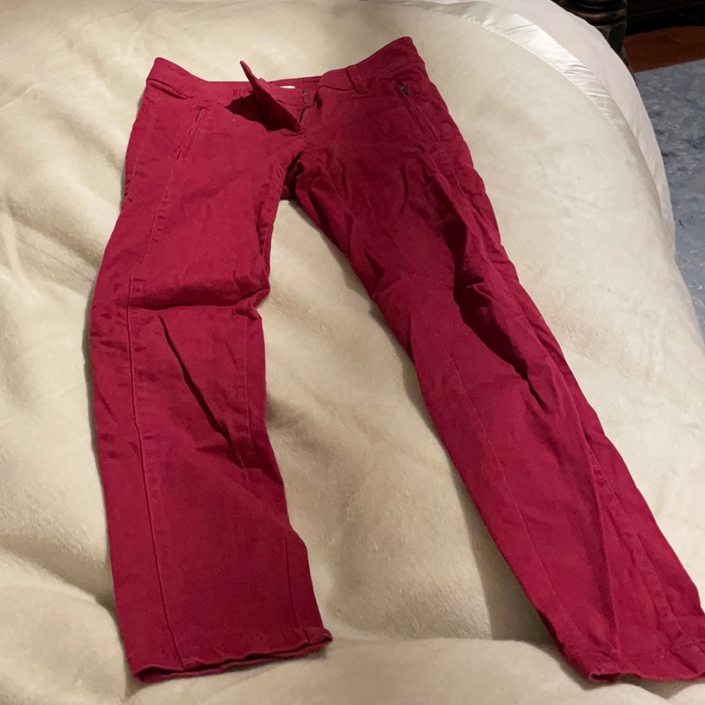 Red comfy loft pants with side zippers.